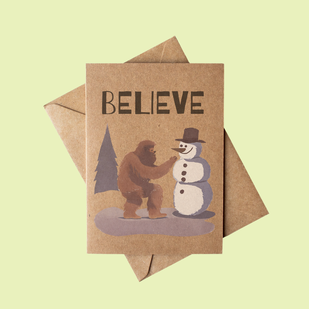 Brown Kraft Paper Rustic Bigfoot Building a Snowman Christmas Card